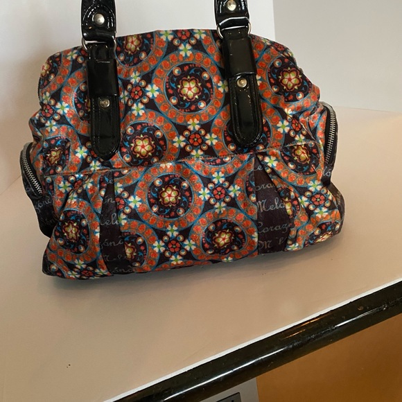 Large vibrant purse/bag with multiple zippers and snaps. Made in Mexico. - Picture 10 of 16